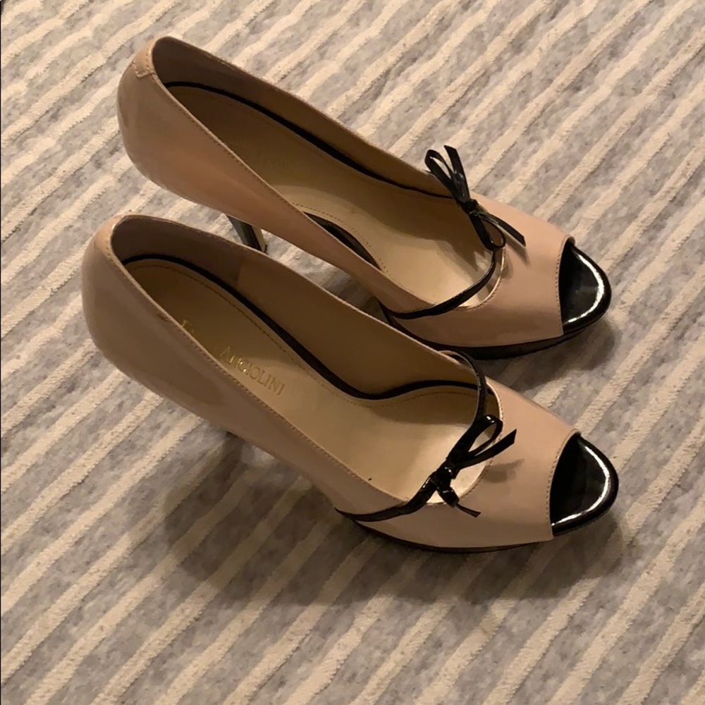 Lightly worn beige and black heels